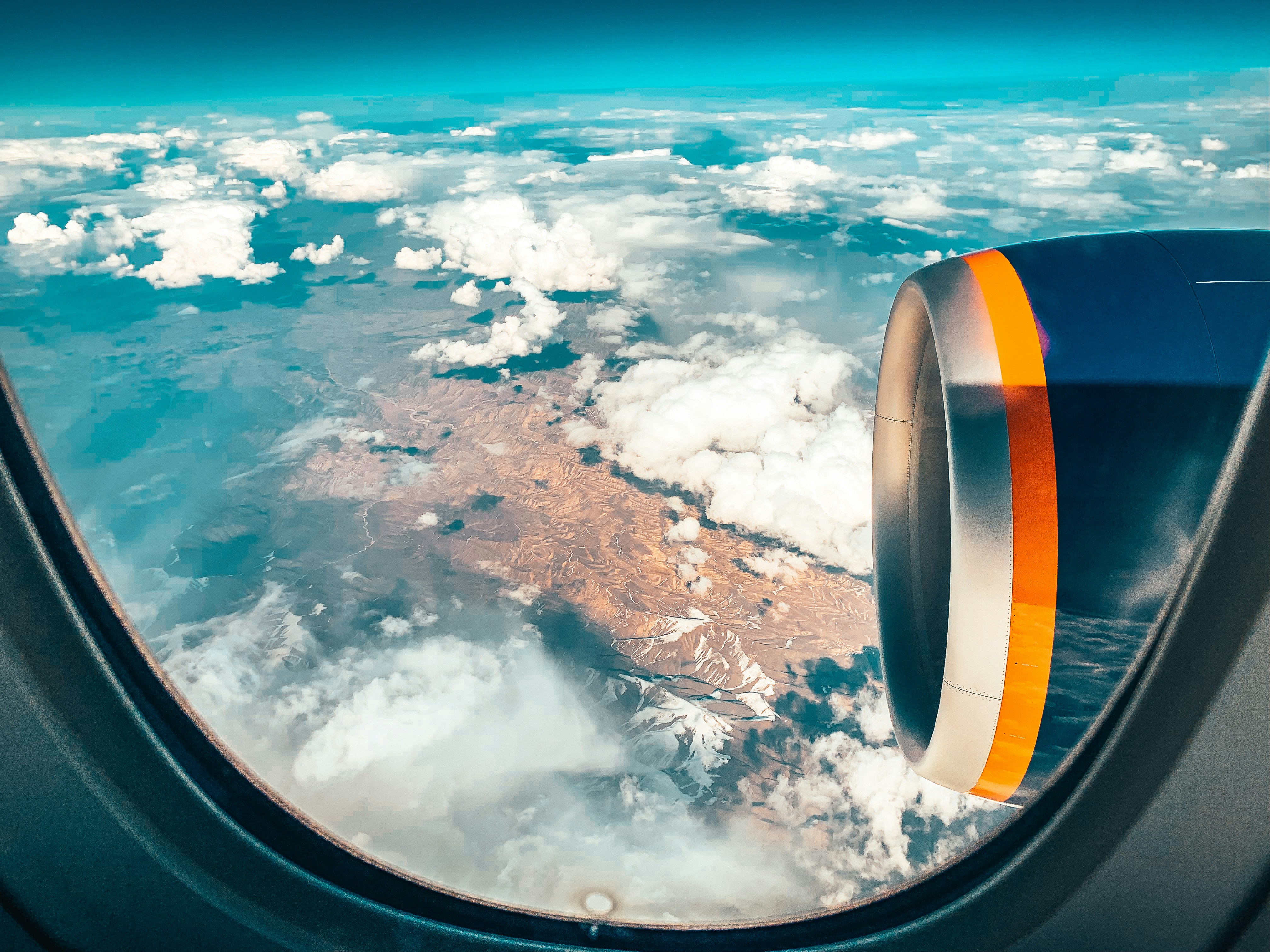 airplane wing and clouds