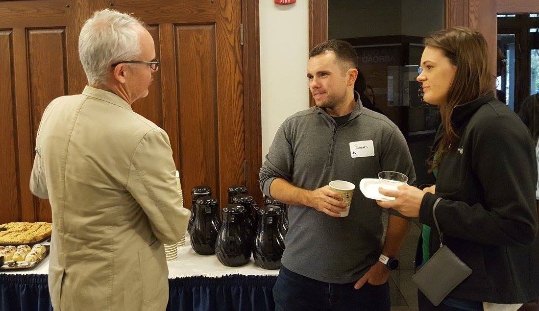 Professor Holly with EIUi Alumni at the 50th Anniversary Reception