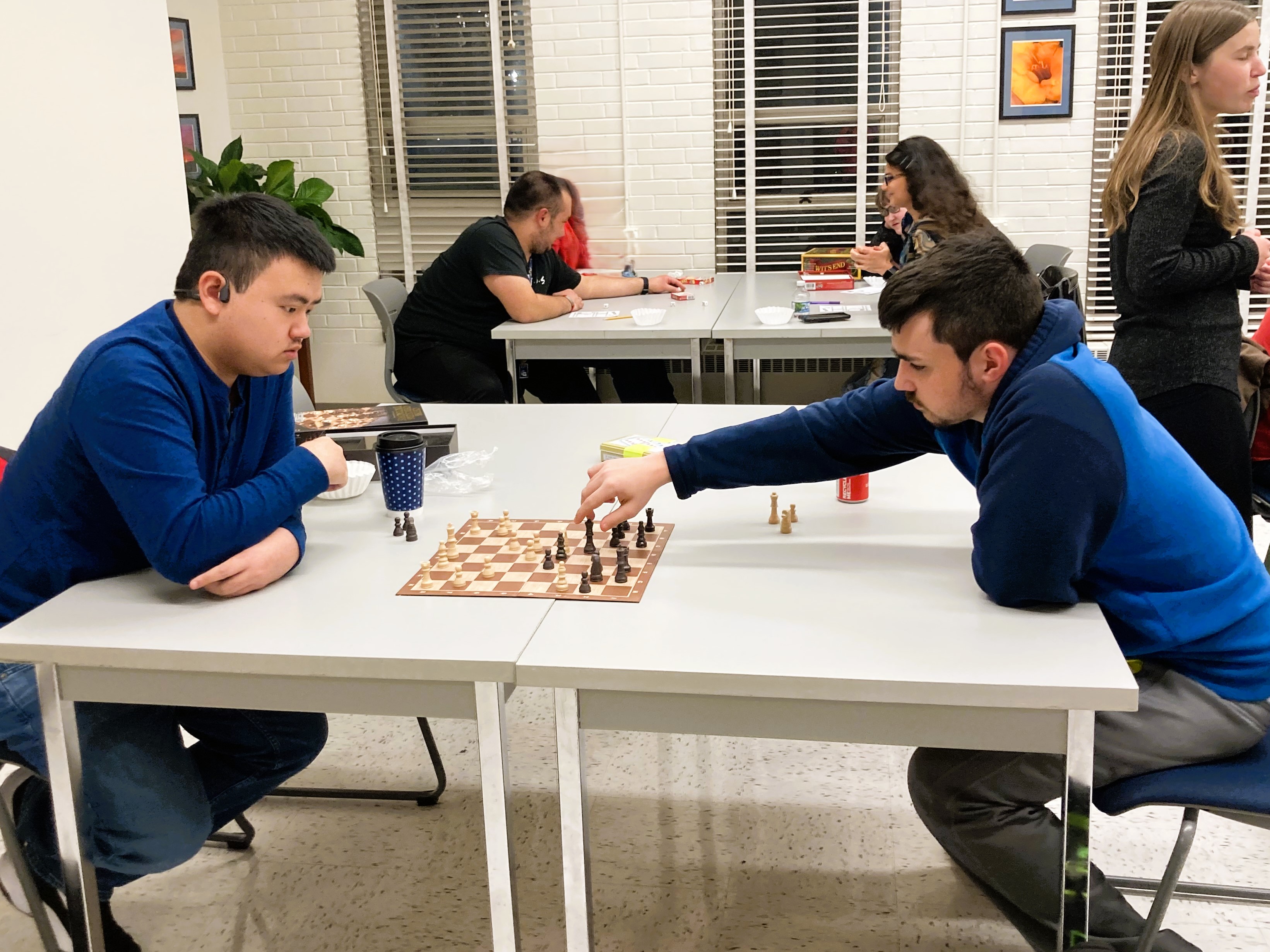 Drew and Caleb Playing Chess Finals FA22