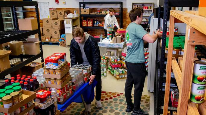 students getting food in food pantry